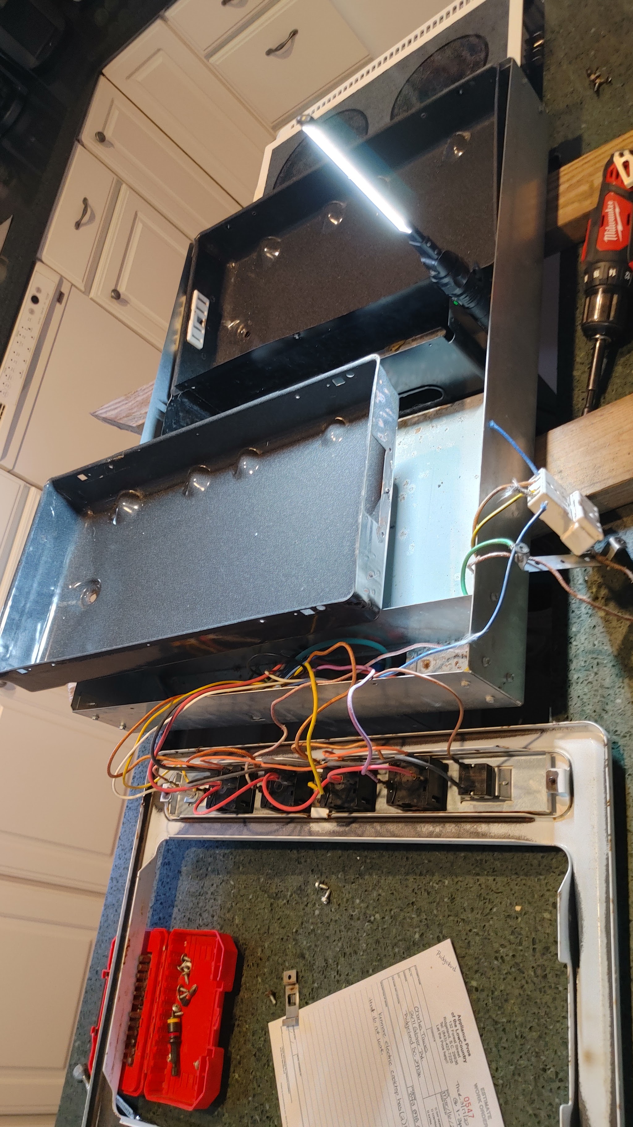 Oven control wiring exposed for diagnosis